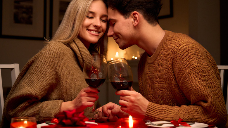 Couple having Valentine's Day dessert with wine