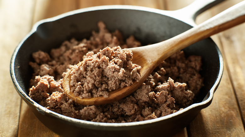 Cooked ground beef in skillet