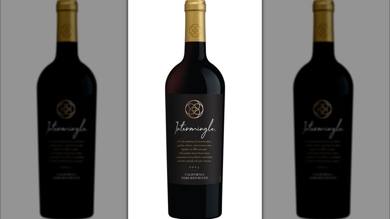 Bottle of Aldi brand Intermingle Dark Red Blend wine.