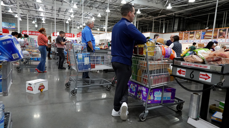 customers waiting in Costco checkout lines