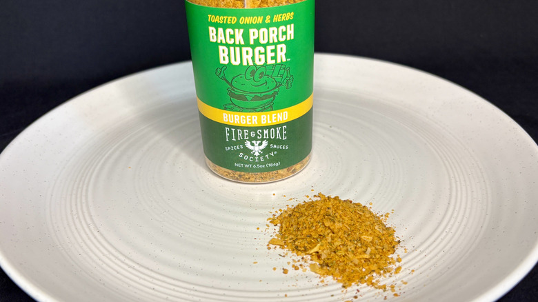 Fire and Smoke Society seasoning on a plate with green jar in background
