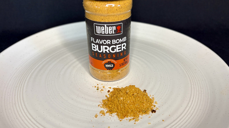 Webber seasoning on a plate with jar in background