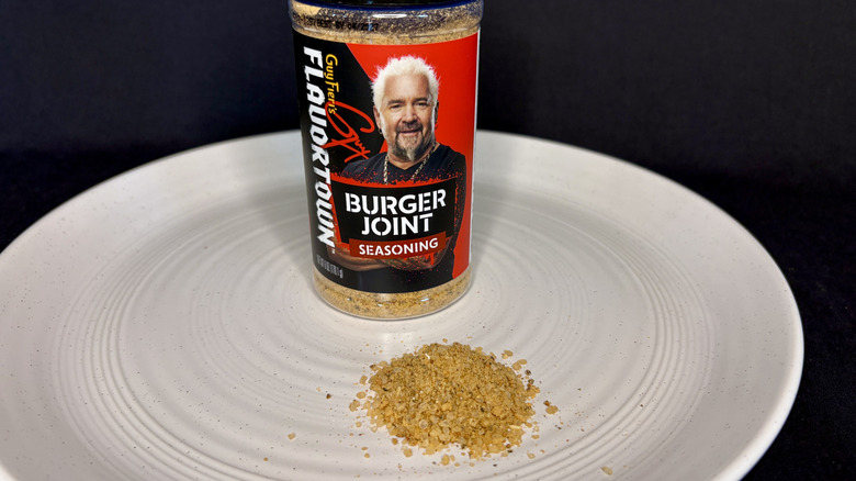 Flavortown seasoning on a plate with jar in background