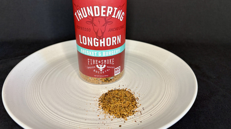 Fire and Smoke Society seasoning on a plate with red jar in background