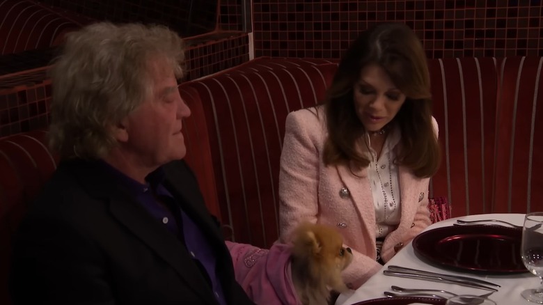 Lisa Vanderpump, her husband, and their Pomeranian wait to be served on "Hell's Kitchen"