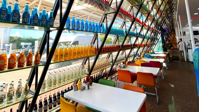 Rows of color coordinated sodas at Pops 66