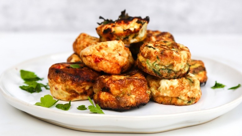 plate with egg muffin and garnish