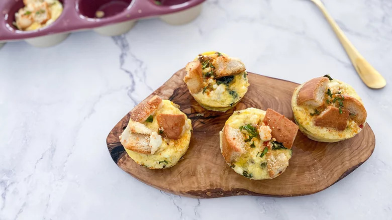 wooden board with egg casseroles