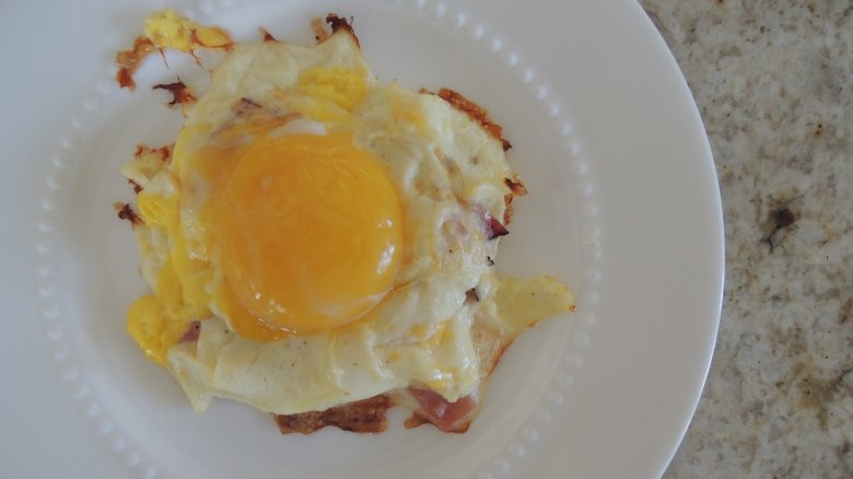plate with ham and cheese cloud egg