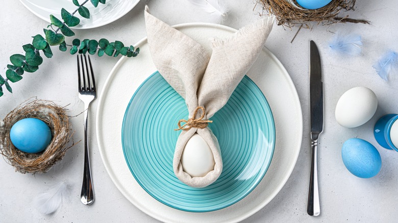 easter table setting with easter eggs