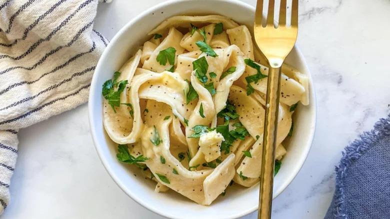 bowl of egg noodles with fork