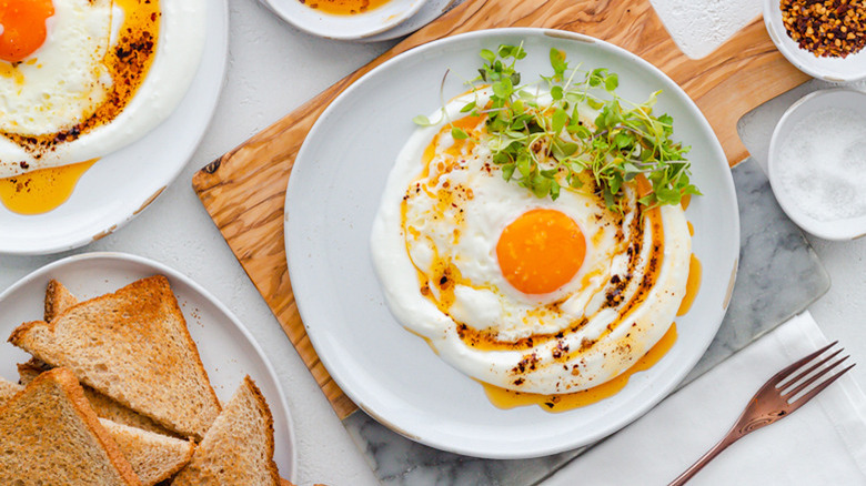 plates with turkish eggs and toast