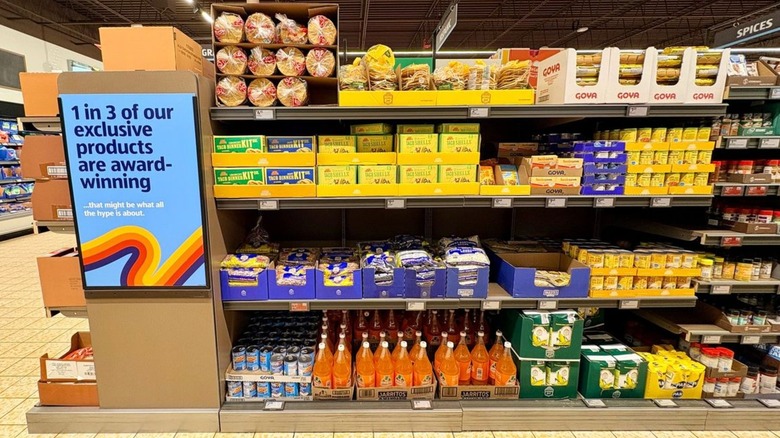 Aisle in Aldi with signage promoting the store's award winning products.