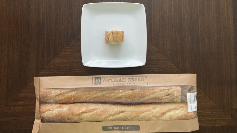 Sam's Club baguettes in a packet with a slice on a plate
