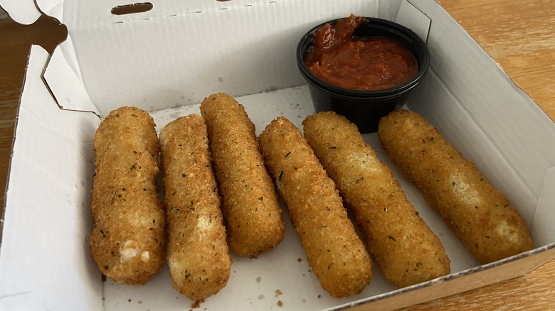 to-go container of Buffalo Wild Wings mozzarella sticks