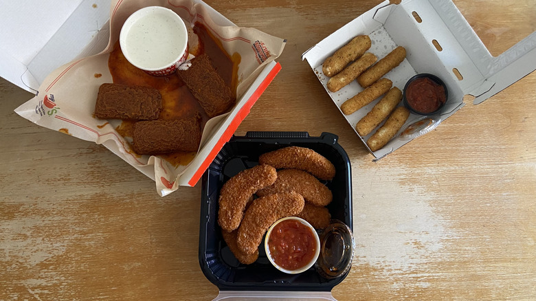 overhead view of all three sit-down chain mozzarella sticks