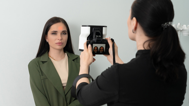 Person getting passport photo taken