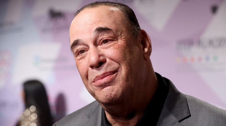 Headshot of Jon Taffer smiling and looking next to the camera