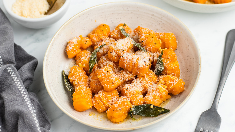 Orange-colored pasta in bowl