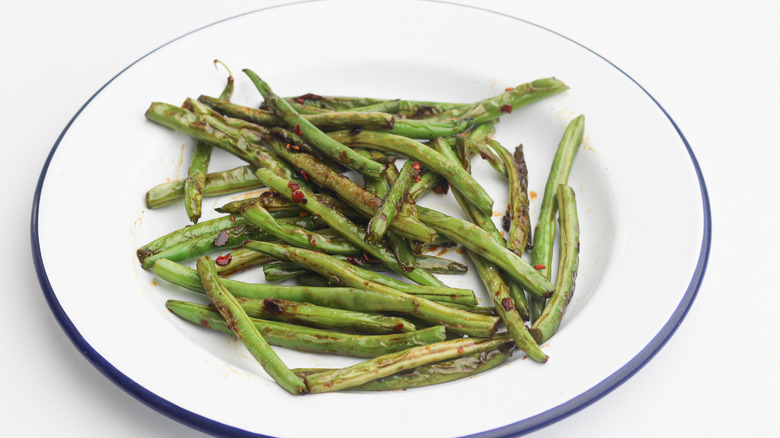 green beans on white plate