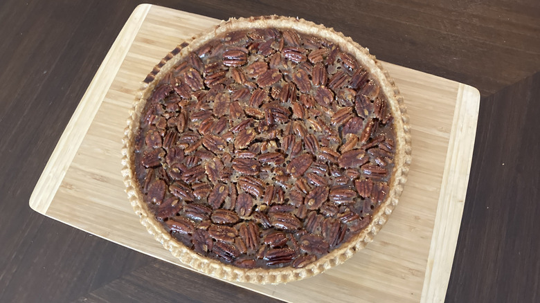 Costco pecan pie on wooden board