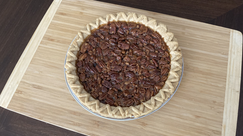 Marie Callender's pecan pie on wooden board