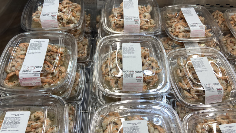 a couple dozen containers of cilantro lime shrimp