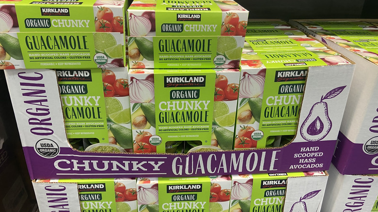 cardboard cases of Kirkland Organic Chunky Guacamole packs