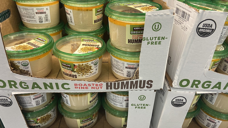 cardboard boxes of organic hummus