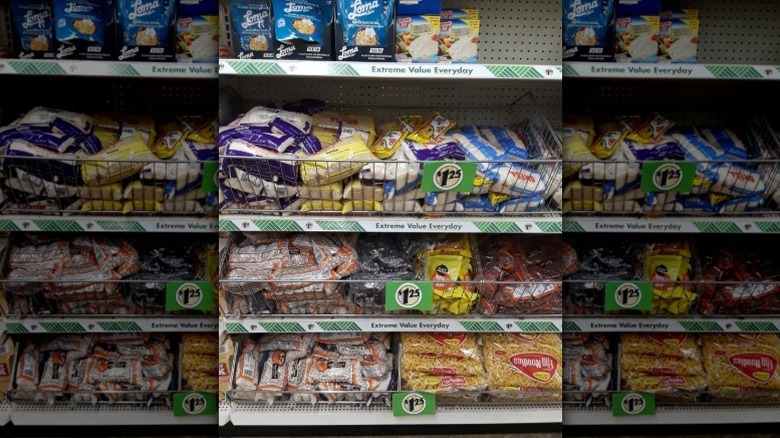 full shelves of rice, pastas, and other grains at the Dollar Tree