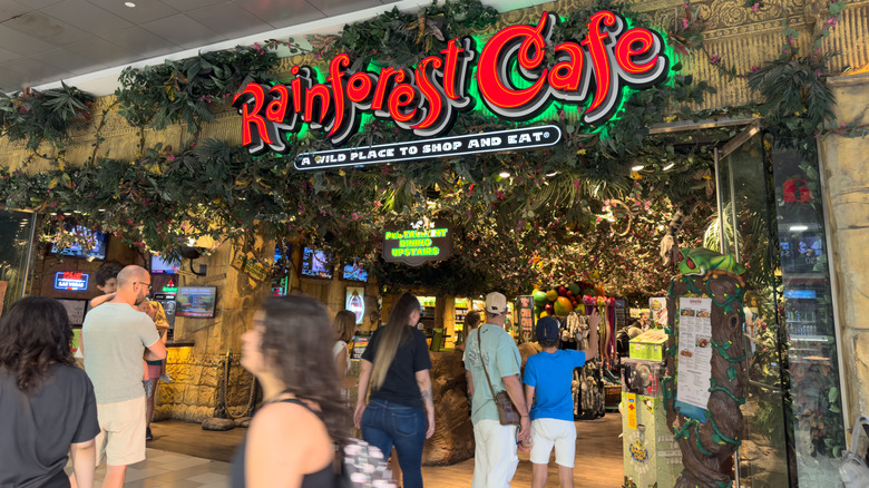 People walking into a Rainforest Cafe location