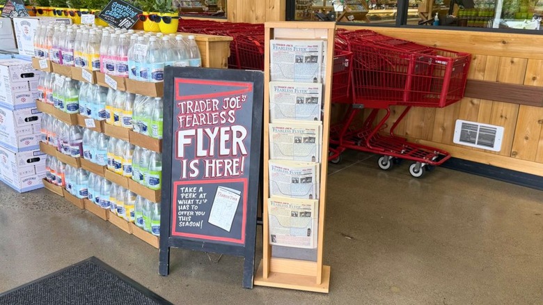 Trader Joe's signage and display advertising the store's Fearless Flyer newsletter.