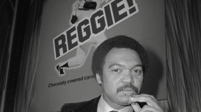 Reggie Jackson eating a Reggie! Bar