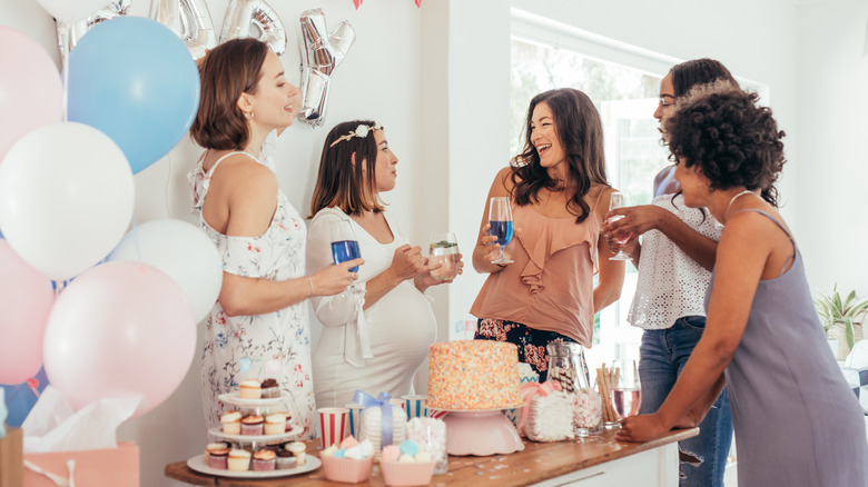 baby shower party with women and cake