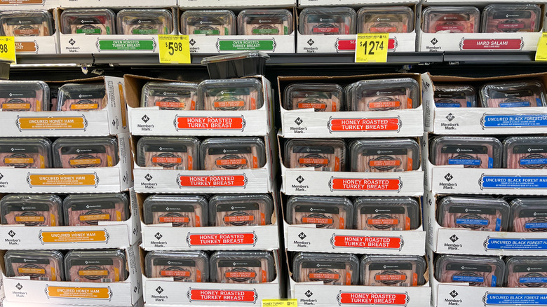 Packages of cold cuts in a Sam's Club deli section