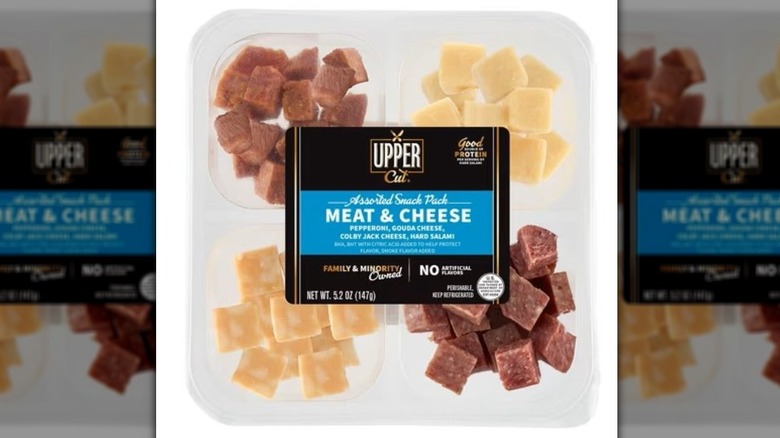 Meat and cheese snack pack with chunks of salami, pepperoni, and two kinds of cheese