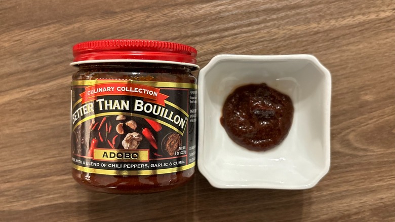 Better Than Bouillon Adobo Base in a jar and a dollop in a white ramekin