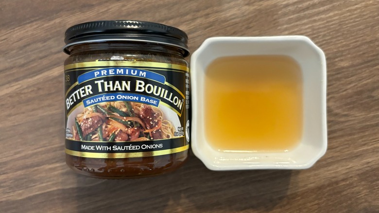 Better Than Bouillon sautéed onion base in a jar and broth in a white ramekin
