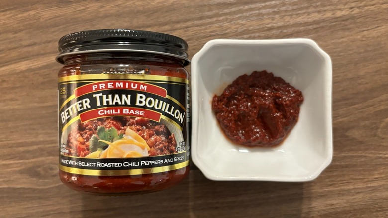Better Than Bouillon Chili Base in a jar and a red dollop in a white ramekin