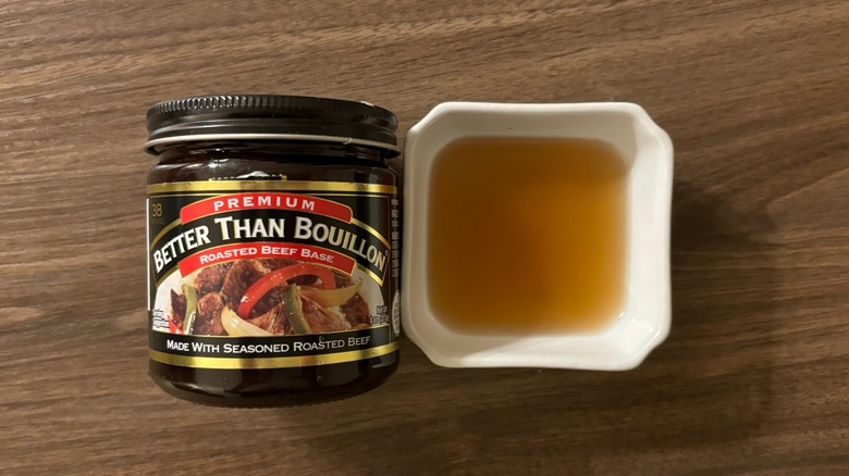 Better Than Bouillon Roasted Beef in a jar and broth in a white ramekin