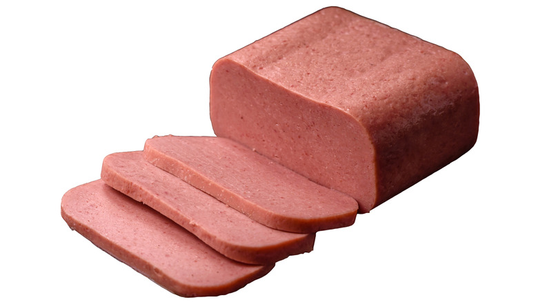 Canned ham on white background