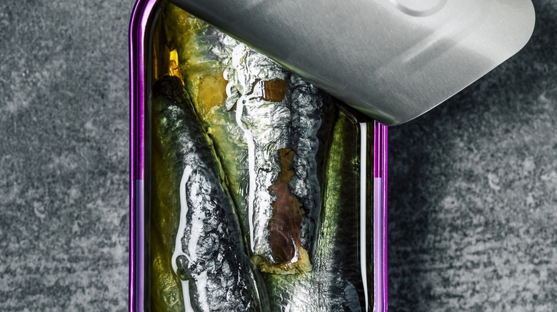 Can of sardines close-up in purple can