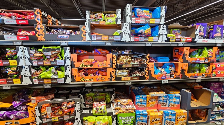 Assortment of Halloween candy inside Aldi store.