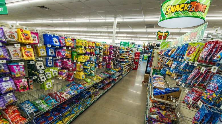 Snack and candy display inside Dollar Tree store.