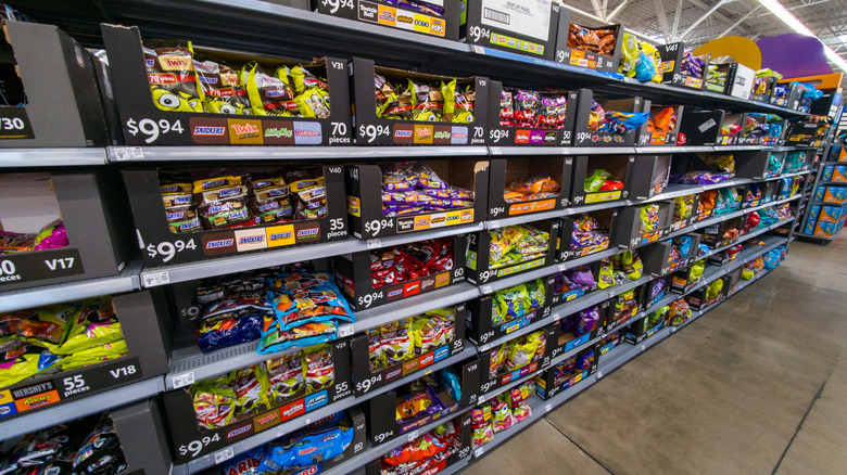 Halloween candy aisle inside Walmart store.