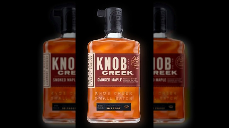 Knob Creek Smoked Maple in a bottle with black background