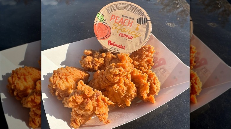 Basket of Bo Bites with peach honey pepper sauce