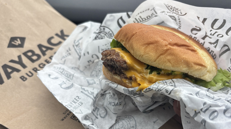 Wayback cheeseburger smash patties with melted American cheese in fast food wrapper