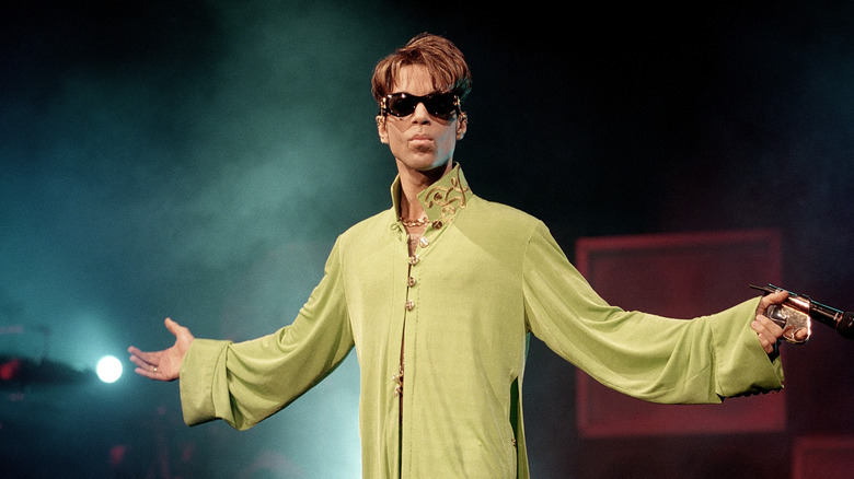 Prince wearing sunglasses onstage