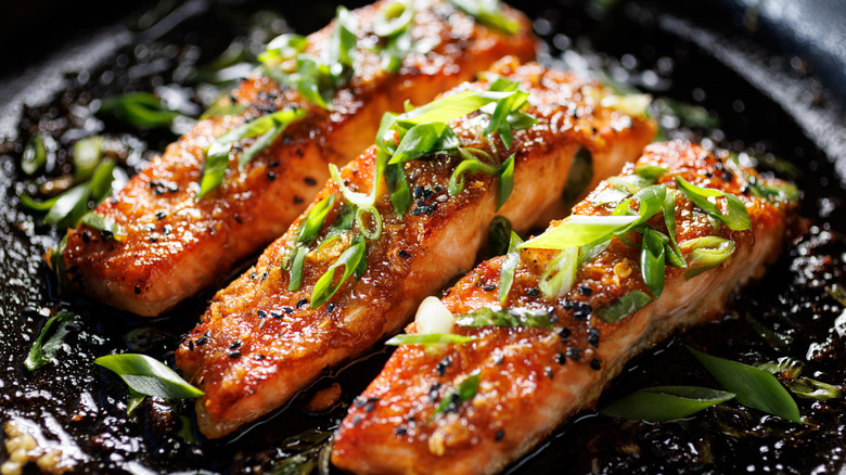 Three strips of teriyaki salmon